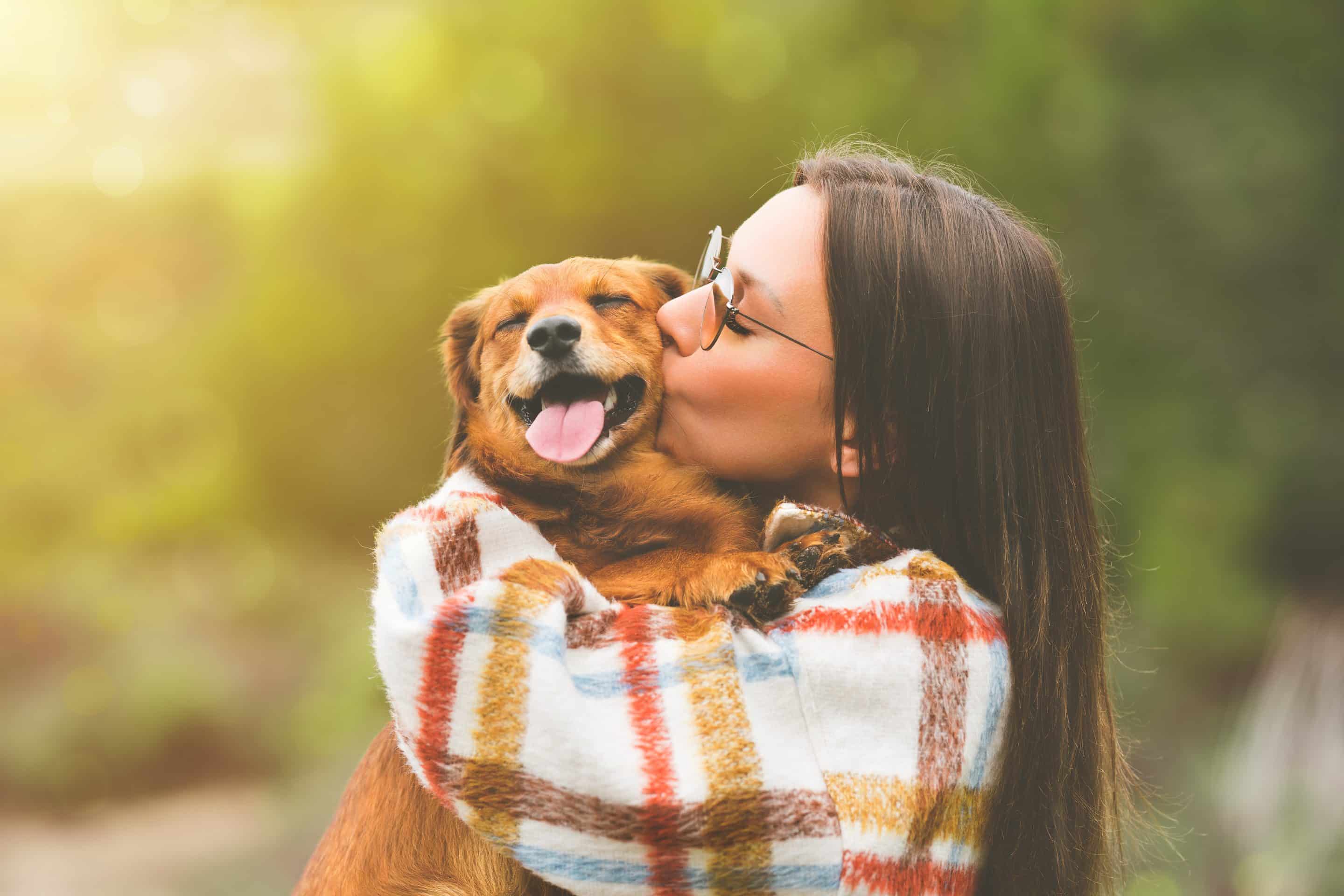 Woman kisses her dog in Nashville TN